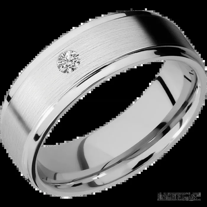 7 mm wide/Flat Grooved Edges/14K White Gold band with an arrangement of 1, .1 carat Round Diamond stones in a Flush setting.
