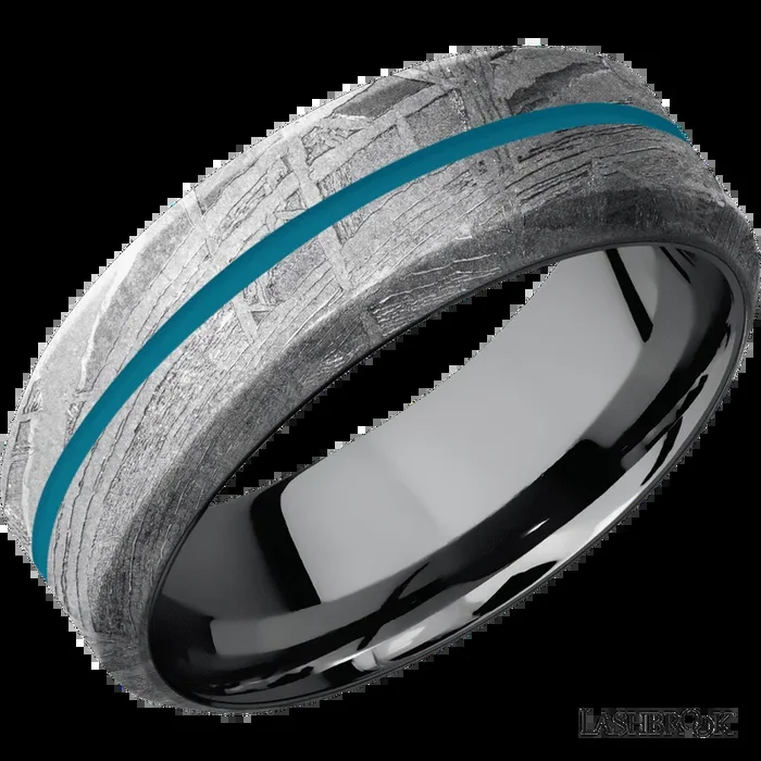 8 mm wide/High Bevel/Meteorite band with one 1 mm Centered inlay of Sea Blue also featuring a Tantalum sleeve.