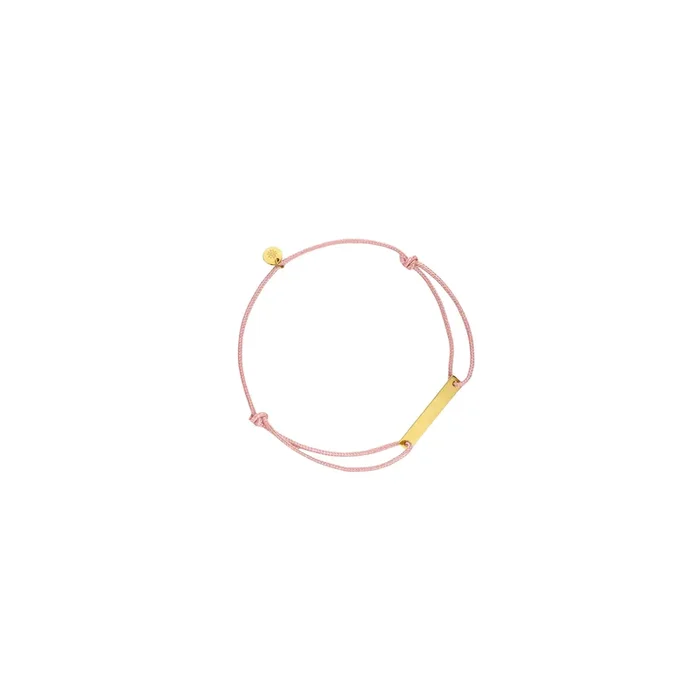 Arthus Bertrand Liquorice bracelet in yellow gold on pink cord | LEPAGE