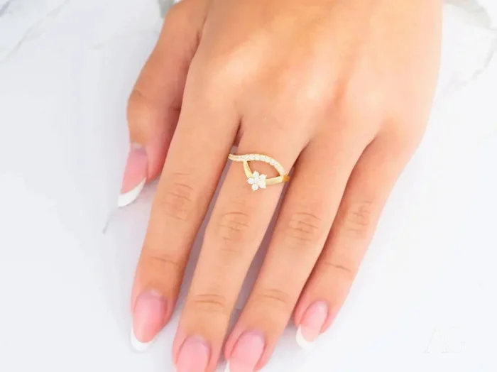 Embrace elegance with our 18k yellow gold cz flower ring