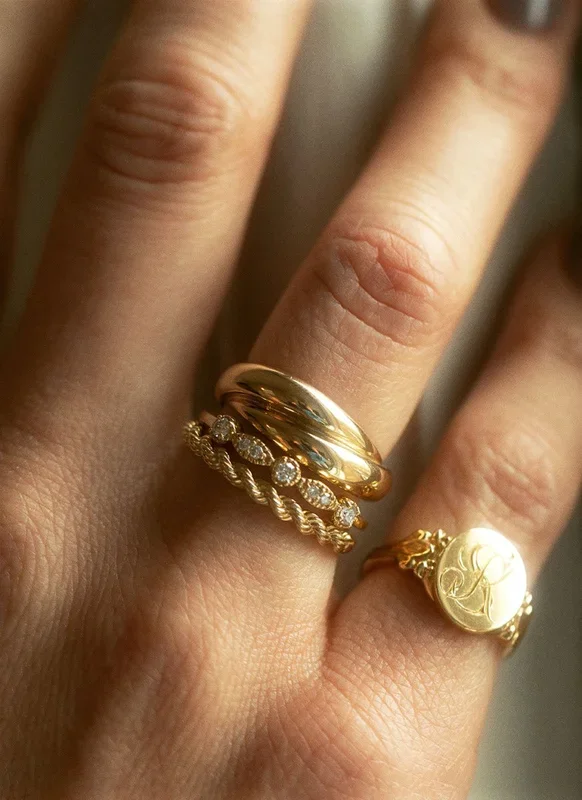 Leena twist ring 14k goud