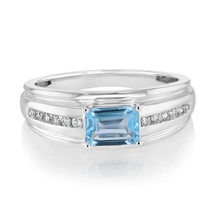 Natural Blue Topaz and 1/6 Carat Diamond Ring in 9ct White Gold