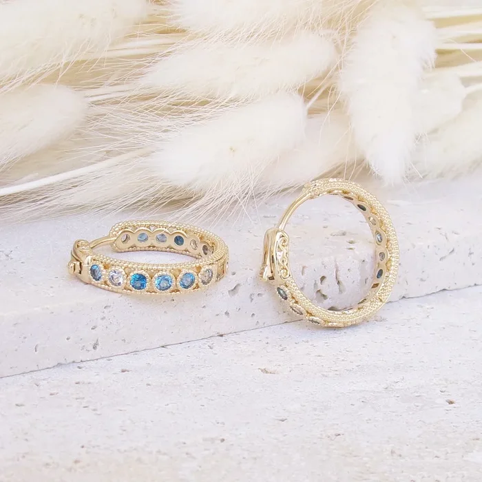 Riva hoop earrings 19mm blue zircons gold-plated