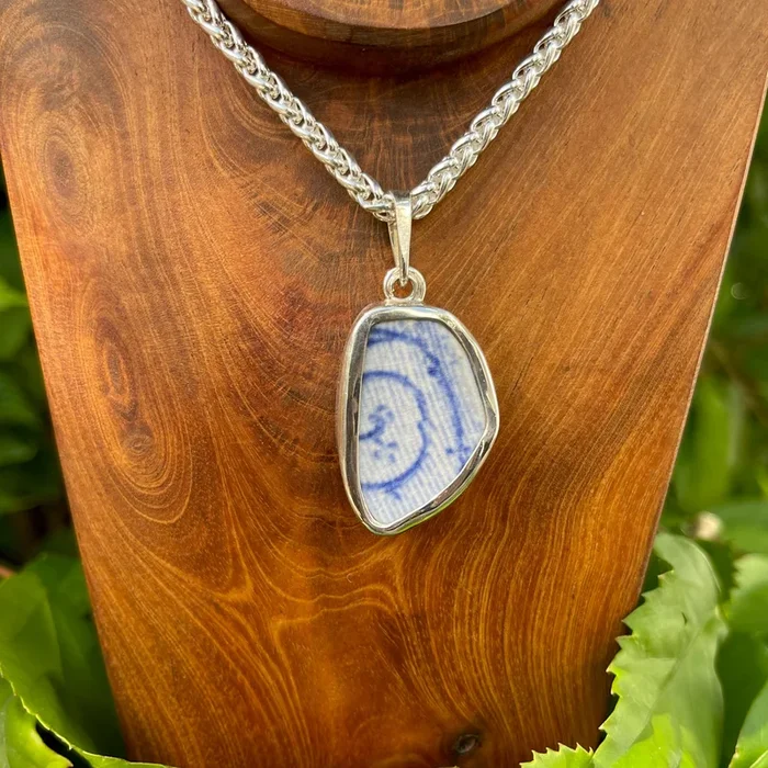 Stylized Sequence Sterling Silver Pendant
