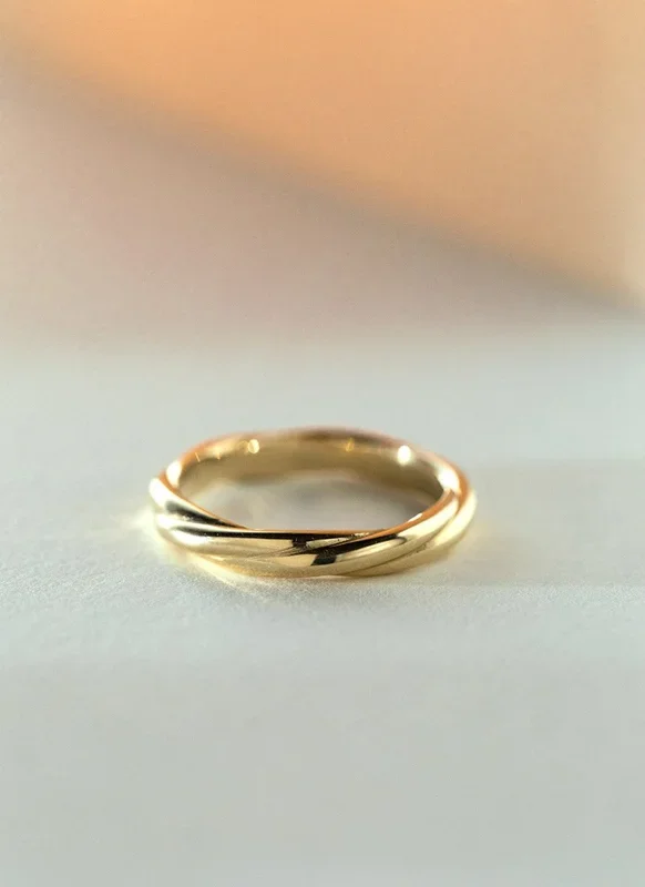 The gent idris twist ring 14k gold