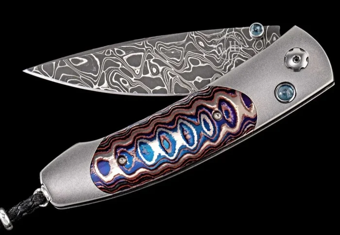 Titanium pocketknife with ‘Wave’ mokume and damascus blade