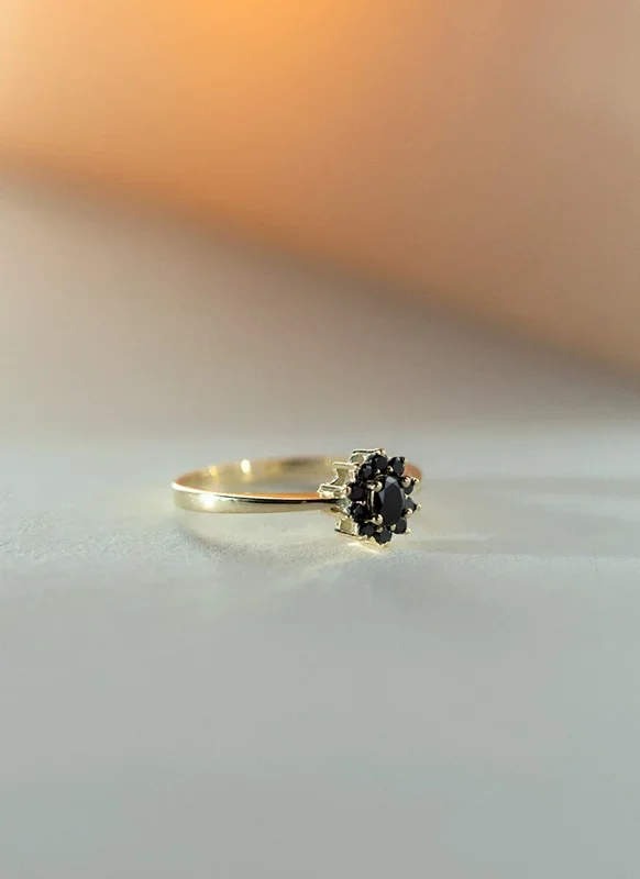 Triss oval halo black diamond ring 14k gold